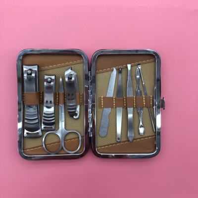 A 9 - piece stainless steel manicure and manicure kit