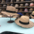 A straw hat a Panama hat with a brim