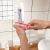 KM 6332 transparent vertical toothpaste squeezer squeezer toothpaste holder, hand cream cleanser mustard extruder color mix