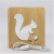 Cross - border squirrel wooden handicraft wood small night light hollow carving can be customized