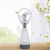Pop selling mini spray fan Creative Portable Annulment Cooling battery gift spray small fan wholesale