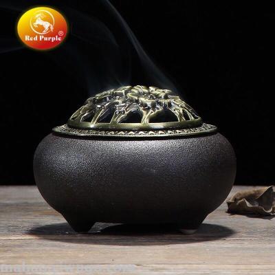 Ceramic incense burner with copper cover