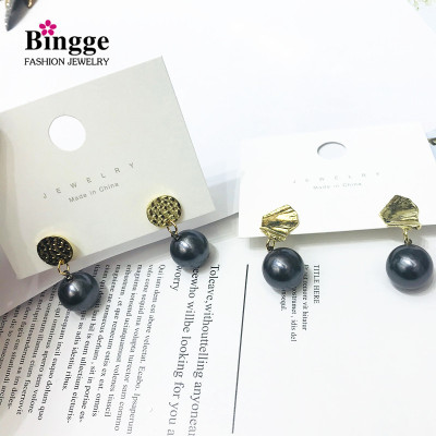 Ins simple temperament Web celebrity Pearl Earring female fashion alloy stud Trimmed earth supply