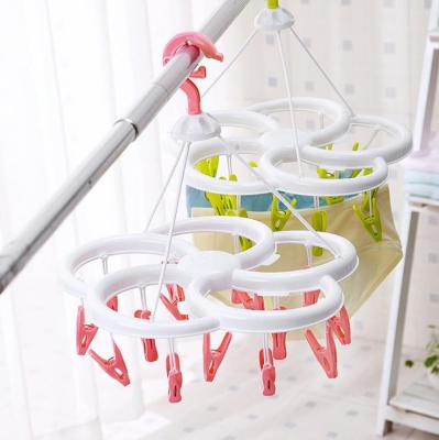 Modern simple circular plastic daily red multi - drying thanks racks primary source