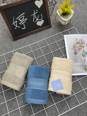 Shanghai Ting Long home textile pure cotton super absorbent gold silk towel plain color simple atmospheric towel