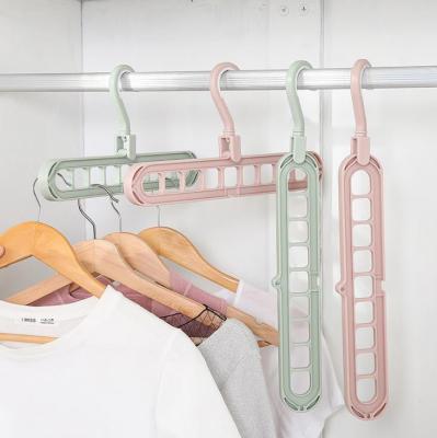 Modern simple plastic daily provisions Nordic green clothing racks manufacturers wholesale