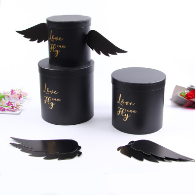 New angel wings holding a barrel cylindric flower gift box three - piece bouquet cylindrical flower barrel packaging box the custom