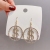 European and American personality Dollar modeling Overwhelm Circular Flash Diamond earrings female Hyuna coin earrings