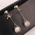 925 Silver Needle Opal Earrings Female Temperament Korean Internet Celebrity All-Matching Long Bow Zircon Earrings Face Slimming