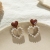 S925 Silver Needle Korea Hollow out love Pearl Drop Earrings Sweet temperament Nectarine heart Manufactures Direct