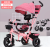 The manufacturer's new children's tricycle has a folding, swiveling seat baby stroller