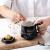 Marbled coffee cup with a spoon and a top grade coffee cup.