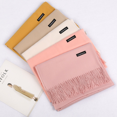 The new cashmere scarves in autumn and winter pure color are 250 g hot style monochromatic tassel twill with versatile warm wrap