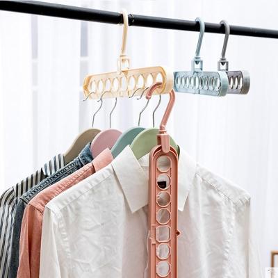 Floating wardrobe hanger household multi-function folding hanger receive pants wearing pants trill in the same gap lag