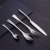 Kaya stainless steel western tableware, European style, simple gift box, knife, fork and spoon, four - piece set of hotel supplies, fishtail design