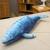 A plush blue whale cuddle toy from Japan