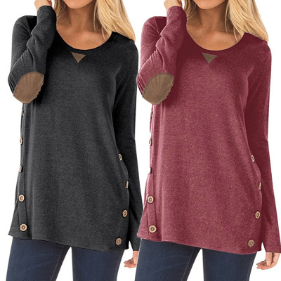 A new round neck and long sleeve button patch Decorated T-shirt for women