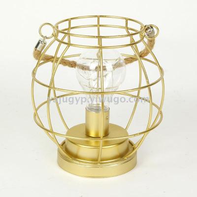 Wrought iron candlestick furnishing piece creative hollow-out windproof lamp retro European scented candle table furnishing piece metal