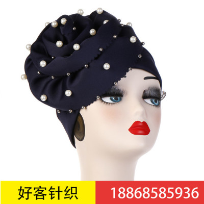New headscarves, oversized flower nails and pearl Muslim baotou hats in solid color and large flowered hats, are on sale