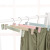 Popular Factory Direct Sales Non-Slip Color Plastic Frosted Clothes Hanger Pant Rack Wholesale Retractable Trouser Press