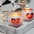 Amazon sells romantic candlelit dinner bar decor pieces with white bottoms, red hearts, round balls, candlesticks and candlesticks