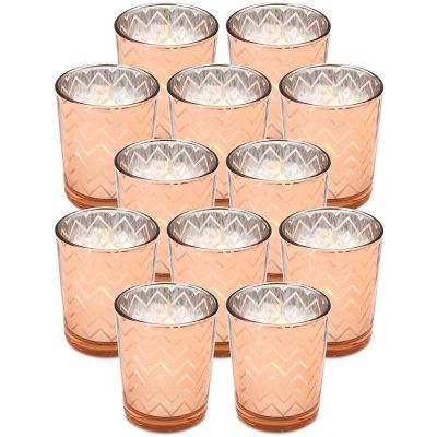 Amazon sells rose gold electroplated candle cups as a 12-piece set of decorative candlesticks for wedding restaurants