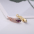 Korean version of super personality feather creative women simple micro - inlaid with zirconium pendant Ins trendy cool casual accessories
