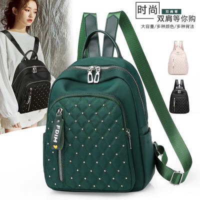 2020 New Women's Bag Oxford Cloth Backpack Waterproof Nylon Schoolbag Women's Korean Style Rivet Casual Backpack Wholesale