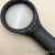Factory Direct Sales New 9986a with 3 LED Lights Magnifying Glass Quality Wholesale Portable Handheld Magnifying Glass