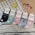 Stall Socks Wholesale Hot Little Daisy Love Smiley Socks High-like Rib Women's Sport Socks