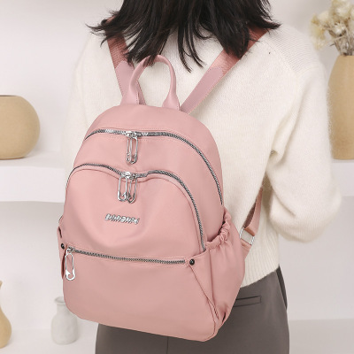 2020 New Backpack Female Korean Junior High School Students Japanese Simple Casual Backpack Large Capacity Campus Bag