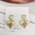 Sterling Silver Needle Exquisite Irregular Woven Heart Earrings Retro Hong Kong Style Earrings Female Personality Simple Gold Stud Earrings