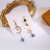 925 Silver Needle Elegant Blue Rhinestone Water Drop Moon Tassel Earrings Personality Asymmetric Long Ear Studs Earrings Women