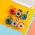 K179 Creative in-Ear Small Earphone Donut Cable Winder Wire-Controlled Voice Call Cute Children's Headphones.