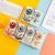 K179 Creative in-Ear Small Earphone Donut Cable Winder Wire-Controlled Voice Call Cute Children's Headphones.