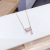 2020 New Titanium Steel Necklace Small Waist Necklace Hollow Tassel Circle Rotating Necklace Female Niche Female Accessories