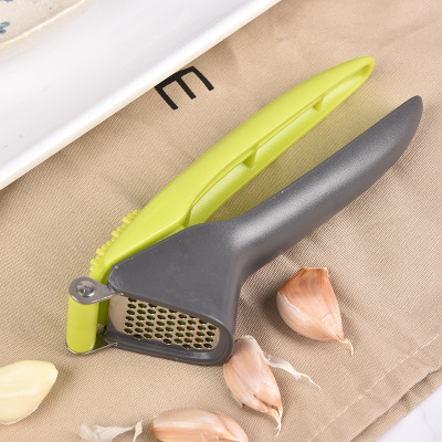 CrossBorder Plastic Handle Plastic Garlic Press New Garlic Press Stainless Steel Meshed Garlic Device Garlic Press