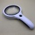 Handheld with LED Light Adjustable Light High Magnification Reading Gift Magnifier 95108b (RD)