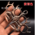Wholesale Brass Knuckle Iron Four Finger Finger Holder Body Tools Military Fans' Supplies Scorpion Multicolor