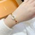 Simple Graceful Peace Buckle Alluvial Gold Non-Fading Diamond Bracelet Women's All-Match round Design Palace Style Bracelet Jewelry