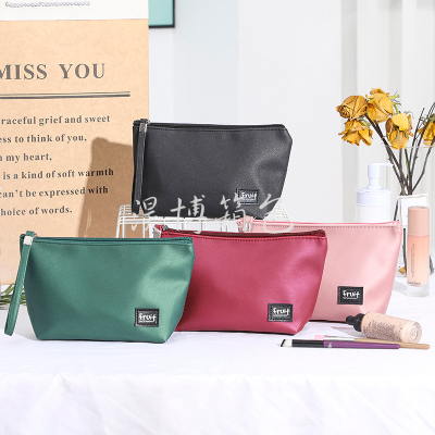 Factory Customized New Pure Color Simple Washing and Makeup Bag Carry Pu Waterproof Storage Hand Bag Wholesale