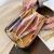 2021 New Wallet Women Pu Women's Zipper Long and Simple Embossed Woven Solid Color Large Capacity Wallet Coin Purse