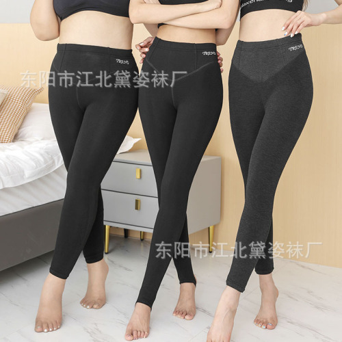 2021 autumn and winter new women‘s winter flower silk thickened small black trousers inside and outside double wear warm one-piece pants