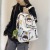 Foreign Trade Model 2021 New Funny Graffiti Couple Backpack Fun Street Tide Brand Backpack Male Student Schoolbag