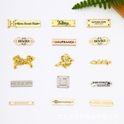 Customized Hardware Clothing Accessories Clothing Metal Tag Stitching Nameplate Golden Sign Epoxy Black Logo Customization