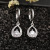 Wish Hot Sale Electroplated Platinum Zircon Earrings European and American Travel Commemorative Drop-Shaped Earrings Factory Direct Supply