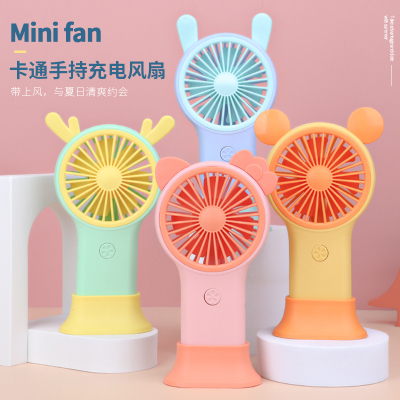 2022 New Factory Direct Sales Cartoon Handheld Charging Fan Belt Base Colorful Light