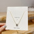 Simple Fashion in Europe and America Small Waist Micro-Inlaid Titanium Steel Necklace Women's Design Drop Oil Short Clavicle Chain Internet Celebrity Necklace