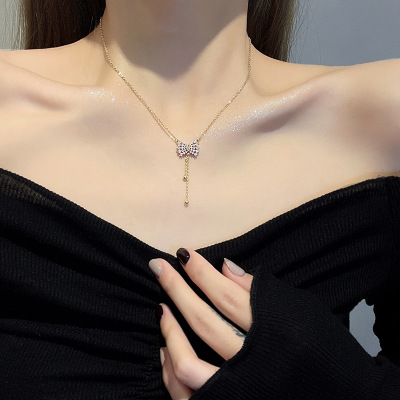 Long Fringed Zircon Bow Titanium Steel Necklace Women's Fashion Simple Design Clavicle Chain Cold Wind Net Red Pendant
