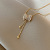 Long Fringed Zircon Bow Titanium Steel Necklace Women's Fashion Simple Design Clavicle Chain Cold Wind Net Red Pendant